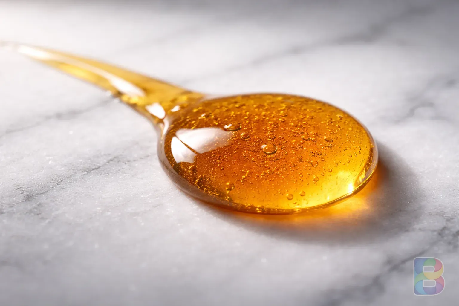 photorealistic, macro shot of a honey drop on a white marble surface, clean, minimalist, high contrast, studio lighting